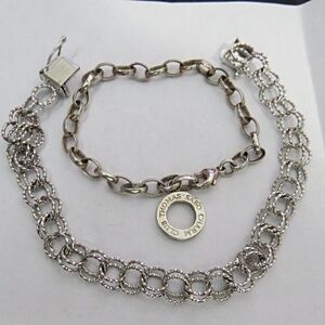 2 Sterling Silver Bracelets  1 Thomas Sabo (Small)  1 Charm Bracelet